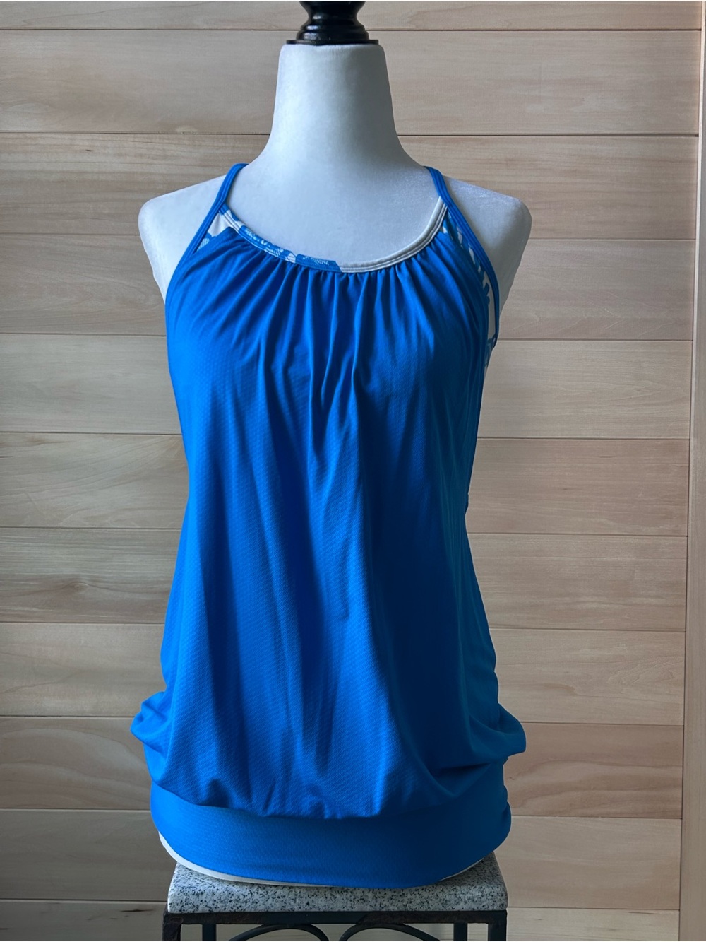 Lululemon No Limits Tank Size 6 Blue built-in bra striped peeking back straps.